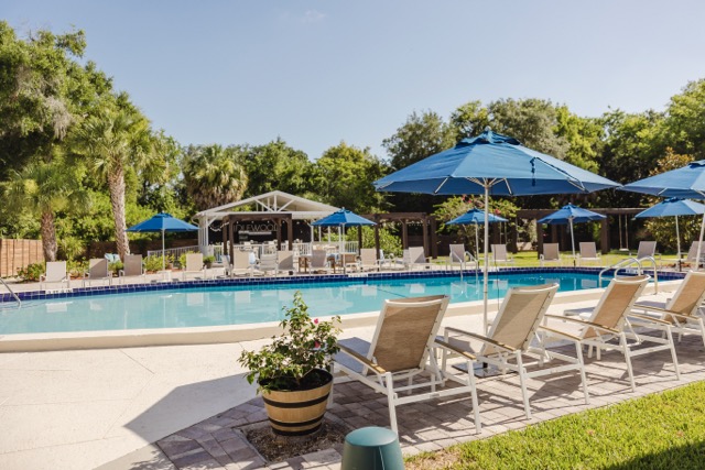 The pool deck and covered outdoor bar